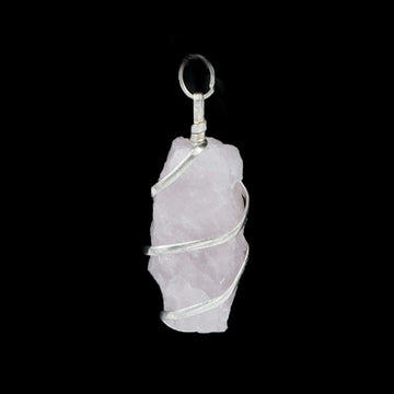 Unconditional love that opens the heart chakra Raw Rose Quartz Heart Shape Pendant
